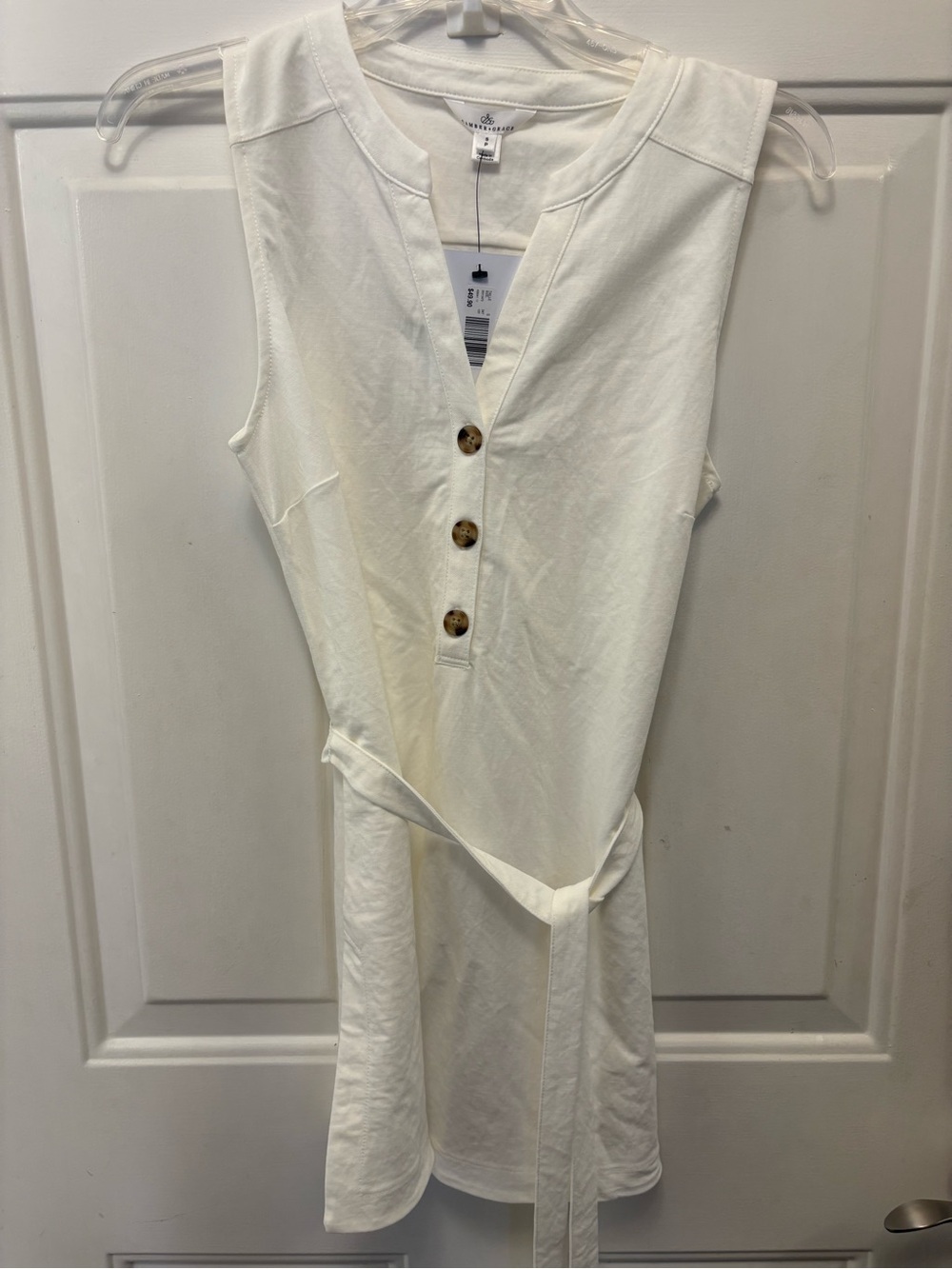 Sleeveless White Button-Front Tunic with Waist Tie